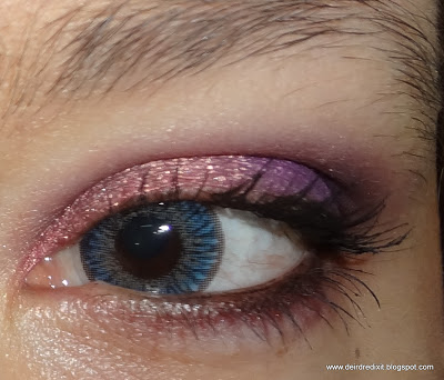 Dettaglio lente Eyemed su occhio scuro Dettaglio lente Tri tone light blue applicata su occhio scuro